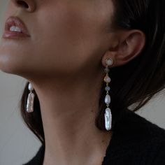 Inspired by a Mediterranean holiday and seaside soirées, our Marseille Long Pearl Earrings feature a delicate cascade of lustrous pearls, moonstone, opal, and gold accents in a stunning drop earring.   70mm drop for maximum impact 12mm freshwater pearl  28mm baroque pearl Genuine Opel & Moonstone elements Always apply lotions, creams & perfumes before jewelry. Store your jewelry in its provided dust pouch in a cool dry place. Clean your jewels with mild soap & warm water – rinse & dry immediatel Elegant Natural Stone Pearl Drop Earrings, Elegant Pearl Drop Earrings With Natural Stones, Elegant Linear Drop Earrings With Natural Stones, Elegant Drop Earrings With Natural Stones, White Natural Stone Pearl Earrings For Wedding, White Pearl Earrings With Natural Stones For Wedding, White Pearl Earrings With Natural Stones, Mediterranean Holiday, Opal Moonstone