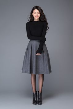 The gray skirt is made of wool blend, the wool skirt has a polyester lining inner The midi skirt has Two side pockets The grey wool skirt is closed by Side zipper The skater skirt for women has Pleated on the skirt   Shop sizing chart FYI ( made according to US sizing. actual body figures, NOT laying flat clothes measurements)  SIZE (US 0, UK 4, Italian 34, French 32, German 30, Japan 1) bust: fits bust around 32.5” / 82.5cm Waist: fits waist around 25” / 64cm Hips: fits hips around... Black And White Outfit, Cooler Style, Grey Skirt, Peplum Tops, Rock Outfit, Populaire Outfits, Winter Skirt, Ținută Casual, Wool Skirt