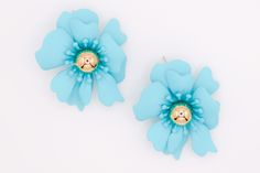 Make your fashion statement with these unique blue flower earrings. Crafted with precision and attention to detail, these earrings are sure to bring out your unique style and make you stand out from the crowd. An ideal accessory for any ensemble, these earrings will be sure to upgrade your fashion outlook. Care: To restore the luster and shine of your jewelry, use a jewelry cloth or soft cotton cloth to gently buff the piece. Size and Fit: 1.8 inches Blue Flower Earrings, Petal Earrings, Designer Party Dresses, Coffee And Espresso Maker, Sustainable Fashion Brands, Heeled Loafers, Romper With Skirt, Sweater Set, Blue Flower