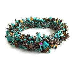 Capullo Seed Bead Magnetic Bracelet Handmade by Women in Guatemala | ShopLumily.com Bohemian Beaded Bracelets With Faceted Beads For Jewelry Making, Handmade Turquoise Beaded Bangle Bracelet, Bohemian Czech Glass Crystal Bracelet With Spacer Beads, Multicolor Hand-strung Beaded Bracelets With Fusion Style, Handmade Czech Glass Stretch Bracelet, Handmade Fusion Style Beaded Bangle Bracelet, Bohemian Czech Glass Crystal Bracelet, Turquoise Beaded Stretch Bangle, Bohemian Czech Glass Beaded Crystal Bracelet