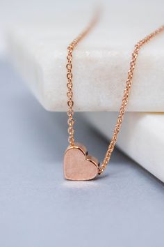 Dainty and stylish Rose gold small Heart charm necklace is great to wear for everyday or special occasions Available in rose gold SIZE ♥ Chain Length : 16.5 '' ( as pictured ) Please you can CHOOSE your chain length( 15 inches - 18 inches ) before purchasing this item ! * necklace sizes * 15 inches: around neck 16 inches: standard short 17 inches: average length 18 inches: standard long SHIPPING TIME Fast shipping within 1 - 3 days **Your order will be ready to be shipped within 3 business days Rose Gold Charm Necklace With Heart Pendant, Rose Gold Heart Pendant Charm Necklace With Delicate Chain, Rose Gold Heart Necklace With Clavicle Chain For Anniversary, Valentine's Day Rose Gold Heart Clavicle Necklace, Rose Gold Heart Pendant Charm Necklace, Rose Gold Open Heart Charm Necklace With Delicate Chain, Rose Gold Open Heart Charm Necklace, Rose Gold Dainty Necklace For Valentine's Day, Dainty Rose Gold Necklace For Valentine's Day