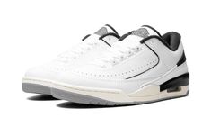 The Jordan 2/3 “White/Black” is a mostly two-toned, white-and-black colorway of the hybrid sneaker that blends elements of the Air Jordan 2 and Air Jordan 3.  The Jordan 2/3 combines details from the Jordan 2 and Jordan 3, including the sole unit from the Jordan 3 and the upper construction of the Jordan 2 Low, among other features.  On this colorway, the shoe is complete with a white leather construction with contrasting black accents on the heel counter, “Wings” logo on the tongue, and mudguar Jordan 2 Low, White Black Shoes, Jordan Golf, Jordan 15, Nike X Travis Scott, Air Jordan 2, Black Jordans, Jordans Women, Jordan 2