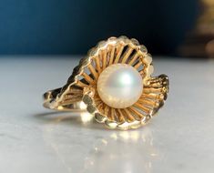 10kt Yellow Gold & White Pearl Ring Ring size: 5 1/4 A sweetheart of a ring. A wonderful piece to dress up or wear every day, or a unique engagement ring. Weighs: 4.4grams White Pearl Ring, Green Tourmaline Ring, Unique Engagement Ring, Tourmaline Ring, Unique Engagement, Green Tourmaline, Ring Ring, Unique Engagement Rings, Pearl Ring