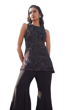 Black sleeveless tunic with thread, mirror, sequin, bead embroidery in sea coral pattern. Paired with border embroidered flared pant. - Aza Fashions Festive Sleeveless Embellished Top, Festive Embellished Sleeveless Top, Festive Evening Sleeveless Top, Sleeveless Sets With Mirror Work, Chic Sleeveless Blouse For Festive Occasions, Elegant Sleeveless Sets With Mirror Work, Sleeveless Top With Mirror Work For Festive Occasion, Sleeveless Tops With Mirror Work For Festive, Elegant Sleeveless Top With Mirror Work