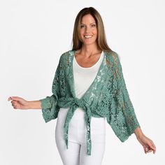 An Indigo Thread favorite crochet design, now in a tie front cardigan silhouette. With the loose dolman sleeves, this light layering piece is so easy to put on over tops, dresses, or even swimwear. Made of 100% Cotton, this casual cardigan comes in fun boho colors. Simplified to two size options, it offers an easy relaxed fit. A throw on and go outfit completer! Spring Layering Open Knit Cover-up, Spring Wrap Cover-up For Layering, Casual Spring Cover-up With Batwing Sleeve, Casual Spring Batwing Sleeve Cover-up, Casual Batwing Sleeve Spring Cover-up, Chic Lace Cardigan, One Size Spring Wrap Cardigan, Open Knit Top With Open Front For Spring, Spring Chic Cardigan With Batwing Sleeves