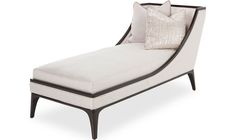 a white chaise lounge chair with pillows on the top and bottom, in front of a white background