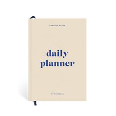 the daily planner is shown in blue on a white background with text that reads daily planner