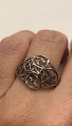 Vintage filigree ring 925 sterling silver Oxidized from age. Size 9.75 can be resized to any size the jeweler charges $10-$20 All rings are shipped free in the US in a nice gift box. Check out our over a THOUSAND great reviews Engraving is $4 per letter and is not always perfect depending on the piece. It can take a few days if the jeweler is busy. This is payable to Paypal Judithsltd@gmail.com Silver Filigree Open Ring For Formal Occasions, Vintage Sterling Silver Filigree Ring With Intricate Design, Silver Vintage Filigree Open Ring, Ornate Silver Engraved Ring Hallmarked, Ornate Silver Engraved Ring With Hallmark, Ornate Sterling Silver Engraved Ring With Intricate Design, Sterling Silver Open Filigree Ring With Intricate Design, Sterling Silver Filigree Open Ring For Anniversary, Gold Sterling Silver Filigree Ring Gift