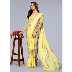 Yellow colored saree is made from art silk fabric which is highlighted with beautiful floral print and crochet border work as shown. comes along unstitched satin blouse piece which you can customise as per your design/style. Occasion - You can wear this saree for party wear. Note:- The actual product may differ slightly in color and design from the one illustrated in the images when compared with computer or mobile screen. Bollywood Style Georgette Digital Prints For Festivals, Festive Georgette Saree With Digital Prints, Festive Georgette Digital Print Saree, Festive Digital Print Georgette Saree, Unstitched Georgette Digital Prints For Diwali, Bollywood Style Georgette Digital Prints With Printed Border, Bollywood Style Digital Prints With Printed Border On Georgette, Yellow Semi-stitched Saree With Printed Border, Semi-stitched Yellow Saree With Printed Border