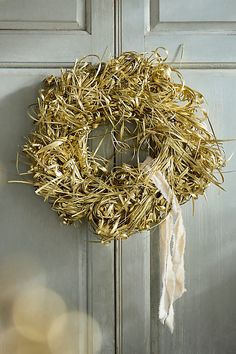 a close up of a wreath on a door