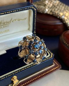 1900 Antique Victorian Women's Ring Rose Gold 9K 16 Natural Sapphires Size 6.5 Dear collectors, I am offering a gorgeous piece from my ocean jewels collection!  Unusual 1900 Antique Victorian Women's Ring Rose Gold 9K 16 Natural Sapphires Antique gold ring "Francoise" with 16 sapphires The first half of the 20th century. Masterful handwork. The ring fascinates with its extremely elegant shape - a charming flower with delicate stamens. Eight delicate curved petals in textured gold, complemented b Vintage Sapphire Cluster Ring With Gemstones, Vintage Oval Sapphire Jewelry, Vintage Sapphire Jewelry For Formal Occasions, Estate Oval Jewelry For Gifts, Victorian Gold Sapphire Jewelry, Vintage Round Sapphire Jewelry, Victorian Sapphire Jewelry In Gold, Vintage Sapphire Jewelry With Rose Cut Diamonds, Vintage Rose Cut Diamond Jewelry For Vintage Events