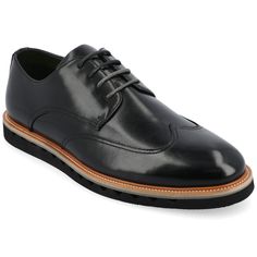 Introducing the Evander derby shoe from Vance Co., a seamless fusion of style and comfort with its 1-inch heel, lace-up closure, and classic round toe design. Crafted from faux leather this style offers a fashionable choice for various occasions. The mesh lining, 6 mm Tru Comfort Foam™ footbed, and rubber outer sole ensure breathability, comfort, and support, making the Evander a versatile and conscious addition to your footwear collection. Black Lace-up Dress Shoes For Derby, Black Brogue Lace-up Shoes For Derby, Black Oxford Lace-up Shoes With Plain Toe, Black Wingtip Derby For Semi-formal Occasions, Black Oxford Lace-up Shoes, Black Wingtip Derby Shoes For Semi-formal Occasions, Black Brogue-detailed Derby For Semi-formal Occasions, Round Toe Oxfords With Laces For Business, Semi-formal Black Derby Shoes With Brogue Detailing