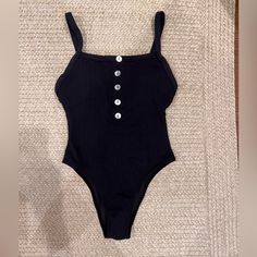 Top Selling One Piece. Extremely Flattering For All Shapes. Almost Functions Like Shape Wear! Cinches The Waist And Provides Good Top Support With Adjustable Straps. Black Ribbed Trendy Bodysuit, Chic Ribbed Bodysuit For The Beach, Summer Vacation Ribbed Bodysuit, Casual Solid Swimwear For Night Out, Summer Beach Ribbed Bodysuit, Summer Fitted Ribbed Bodysuit, Casual Ribbed Bodysuit For The Beach, Summer Ribbed One-piece Bodysuit, Casual Ribbed Swimwear