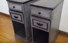 two gray nightstands sitting on top of a hard wood floor