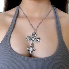 This Silver Cross Necklace features a big vintage cross pendant, making it a statement piece among women's accessories. Perfect as a grunge jewelry gift for her, this chunky cross necklace blends religious symbolism with a bold gothic jewelry style. 𝐃𝐄𝐓𝐀𝐈𝐋𝐒:  ⭐️ Necklace lengths available: 14" 16" 18" 20" 24" 30"  ⭐️ Size of big cross pendant is 3" ⭐️ The large cross pendant is silver plated over metal and the chain necklace is made out of a high quality, lightweight, stainless steel mate Big Chunky Necklaces, Chunky Cross Necklace Outfit, Vintage Cross Necklace In Metal, Vintage Metal Cross Pendant Necklace, Vintage Metal Crucifix Cross Necklace, Vintage Metal Cross Necklace, Vintage Metal Crucifix Necklace, Cross Necklace Outfit, Chunky Cross Necklace