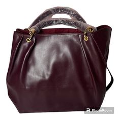 Anna City Bag: Fantastic For Fall And Winter Christmas And Valentines! Perfection In A Bag. Lush Wine-Red Vegan Leather That Feels Utterly Divine. Accented With Gold Hardware And Featuring A Rich Burgundy Colored Interior. The Side Snaps Pop Out For Extra Room New With Tags 20 In Wide 10 Tall And 7 X 10 Base Burgundy Bags With Detachable Handle For Shopping, Burgundy Satchel With Handles For Shopping, Burgundy Double Handle Satchel For Shopping, Burgundy Hobo Tote Bag With Detachable Strap, Burgundy Hobo Bag With Detachable Strap, Burgundy Shoulder Bag With Removable Pouch For Shopping, Burgundy Satchel Shoulder Bag For Shopping, Handheld Burgundy Shoulder Bag For Shopping, Burgundy Handheld Shoulder Bag For Shopping