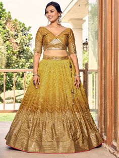 Introducing our outstanding yellow sequins chinon haldi wear lehenga choli, a stunning ensemble perfect for weddings, functions, and other ethnic occasions. This beautiful set includes a yellow color chinon material lehenga with intricate thread embroidered work and sequin embellishments, a matching chinon material choli also adorned with thread embroidery and sequin work, and a light yellow net dupatta with sequin work and attractive lace border detailing.
The semi-stitched lehenga can be adjus Gold Georgette Lehenga For Party Wear, Gold Lehenga With Mirror Work In Georgette, Yellow Anarkali Choli In Georgette, Yellow Chinon Anarkali Set For Party, Yellow Lehenga With Resham Embroidery In Chinon, Yellow Georgette Party Wear Set, Yellow Dola Silk Traditional Wear For Party, Yellow Party Wear Sharara With Traditional Drape, Yellow Dola Silk Sets For Reception