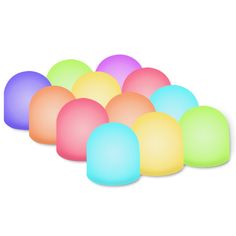 an array of colored eggs on a white background