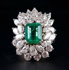 "Specification :- Stone Details :- * Diamond Material : Cubic Zirconia (CZ) * Center Diamond Shape : Emerald Cut  * Total Diamond Weight : 9.66 CT (Approx.)  * Center Diamond Dimension : 10*8 MM * Center Diamond Weight : 3.79 CT  * Side Diamond Dimension : 3.00, 3.50, 5*3 MM * Side Diamond Weight : 5.87 CT  * Diamond Color : Green, White   * Clarity : VVS * Making Process : Handmade by our Experienced Staff. * Stamp : Our All Item Stamped According to metal Purity (925 SIL/10K/14K/18K). Custom O Gemstone Party, Marquise Cut Diamond Ring, Brilliant Cut Diamond Ring, Marquise Cut Engagement Ring, Diamond Rings With Price, Marquise Cut Diamond, Engagement Ring Cuts, Green Diamond, Emerald Cut Diamonds