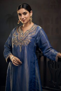 Buy Blue Tissue Hand Embroidered Zardozi Notched Kurta Pant Set For Women by Hirika&Dhruti Online at Aza Fashions. Tissue Silk Kurta With Dabka Work For Reception, Chanderi Kaftan With Gota Work For Wedding, Wedding Straight Kaftan With Gota Work, Reception Kurta In Tissue Silk With Zari Work, Unstitched Kaftan With Gota Work For Diwali, Unstitched Suit With Dori Work For Eid Reception, Diwali Unstitched Kaftan With Gota Work, Bollywood Style Tissue Silk Kurta For Reception, Dola Silk Kurta With Dori Work For Reception