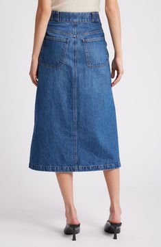 Exposed front buttons and angled patch pockets bring retro appeal to this midi skirt cut from soft denim in the perfect indigo wash. 32" length (size 29) Front button closure Front patch pockets; back patch pockets Unlined 80% regenerative cotton, 20% recycled cotton Machine wash, dry flat Imported Classic Denim Blue Denim Skirt, Knee-length Denim Skirt With Pockets, Classic Straight Leg Denim Skirt With Pockets, Relaxed Knee-length Denim Skirt With Pockets, Knee-length Relaxed Denim Skirt With Pockets, Classic Denim Skirt In Denim Blue, Straight Leg Denim Skirt With Pockets For Work, Classic Denim Blue Skirt, Medium Wash Midi Skirt With Pockets