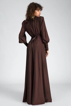 Step into sophistication with our long sleeve belt maxi dress, a fusion of understated elegance and modern sophistication. This exquisite garment features a sleek long-sleeve design complemented by a flattering belt, creating a timeless silhouette that exudes confidence and style. Handmade customization Fabric composition: 90% polyester fiber, 10% spandex Washing method: hand wash or dry clean Popular elements: belt Elegant Long Sleeve Floor-length Dress For Fall, Fall Evening Long Sleeve Floor-length Dress, Elegant Floor-length Long Sleeve Dress For Fall, Chic Long Sleeve Floor-length Dress For Formal Occasions, Formal Long Sleeve Maxi Dress For Fall, Elegant Full-length Long Sleeve Dress For Fall, Elegant Full Length Long Sleeve Dress For Fall, Formal Long Sleeve Floor-length Dress, Formal Floor-length Long Sleeve Dress