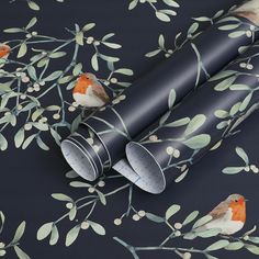 a wallpaper with birds and leaves on it