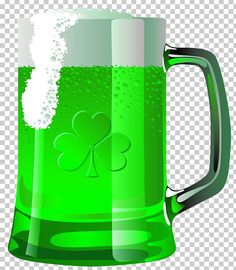 a green beer mug with shamrocks on the side and water droplets in the bottom