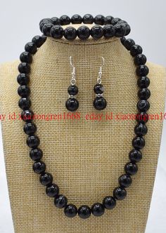 Natural Black Agate Onyx Nephrite Jade Gemstone Bangle Bracelet 56-62mm JewelryProduct Description   •    Style:  Necklace Bracelet Earrings Set •    Size: 10 mm •    Quantity:  1 Set •    length: 18-36&7.5 Inches •    Condition: New, No Box Offer any customization service, length, clasp, color, size etc .   If you want to buy more , please contact us . Thanks !   Payment Policy&Shipping Policy We accept PayPal Please pay within 24 hours If no payment or contact is made with in 7 days item will be relisted. Thank YouPlease make sure the "Ship To" address you input in Paypal is correct.Items are shipped within 1-2 business days. The shipping address must be the same as the Paypal registered address.All of our items are shipped via  Air Mail within 1-2 business days upon receiving paymentand Black Onyx Jewelry With 8mm Beads, Black Onyx 8mm Beads Jewelry, Black Onyx 8mm Bead Jewelry, Adjustable Onyx Bead Jewelry, Black Agate Jewelry With Black Beads, Adjustable Black Jewelry With 8mm Beads, Black Agate Round Bead Jewelry, Black Agate Round Beads Jewelry, Adjustable Jewelry Sets With Gemstone Round Beads