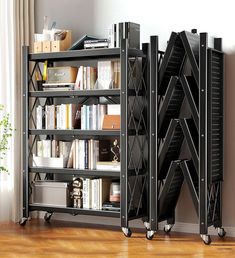 the bookshelf is made from metal and has wheels to move them around it