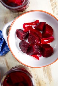 sliced beets sit in a bowl on a table