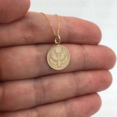 ● Material of pendant: Solid gold 14k ( REAL GOLD ) ● Metal Stamp: 14k ● The pendant is available in 3 sizes: 14,0 mm / 0,55 inches ( Diameter ) 16,5 mm / 0,65 inches ( Diameter ) 19,1 mm / 0,75 inches ( Diameter ) ( In the photos the size of the pendant is 14mm / 0.55 inches Diameter ) ● Material of chain: Solid gold 14k ( REAL GOLD ) ● Chain Options: **Chain No.1  :  thickness 0,7mm  **Chain No.2 :  thickness 1,3mm ● Chain Length: - 40 cm / 15,75 inches ( Length ) - 45 cm / 17,72 inches ( Leng Spiritual 14k Gold Jewelry Stamped 14k, Symbolic 14k Gold Engraved Charm Necklaces, Symbolic Engraved 14k Gold Charm Necklaces, 14k Gold Coin Pendant Jewelry For Commemoration, 14k Gold Coin Pendant Charm Necklace For Anniversary, 14k Gold Charm Necklace With Coin Pendant For Anniversary, Spiritual 14k Gold Charm Necklace For Anniversary, 14k White Gold Jewelry For Commemoration, Commemorative Yellow Gold Jewelry, Tarnish Resistant