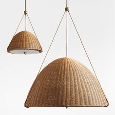 two hanging lights made out of wicker