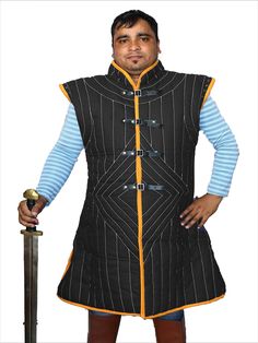 Medieval Gambeson thick padded coat Aketon vest Jacket Armor COSTUMES DRESS SCA   BEST FITTING: Refer to the size chart to find a perfect fitting Gambeson Coat for yourself. CUSTOM DESIGN:  We offer customization in size, design, Materials, colors , thickness, padding, button, laces or other aspects via merchant orders only.   Small        #    Chest-38″ Length From Shoulder-40″   Medium   #    Chest-41″ Length From Shoulder- 40″   Large       #    Chest-44″ Length From Shoulder- 40″  X-Large    #   Chest-47″ Length From Shoulder- 40″   2X-Large  #   Chest-50″ Length From Shoulder- 40″   3X-Large  #   Chest-54″ Length From Shoulder- 40″   Other Custom size also Available 4X- Large # Chest-56″ Length From Shoulder- 40″   5X- Large # Chest-58″ Length From Shoulder- 40″   6X- Large # Chest-60 Medieval Fitted Winter Outerwear, Cotton Costume Outerwear For Fall, Fall Cotton Costume Outerwear, Black Fitted Medieval Outerwear, Medieval Outerwear For Winter Cosplay, Cotton Vest With Padded Collar And Sleeveless Design, Fitted Cotton Vest Outerwear, Winter Cotton Vest With Padded Collar, Cotton Sleeveless Vest With Padded Collar