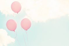 three pink balloons floating in the sky with a quote on it that says look on the bright side