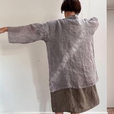 Lightweight natural linen Kimono style jacket, relaxed and easy, perfect for summer, with patch pockets and semi-raw edges.  No closure. Color - grey with purple shade. The purple color seen in day light. Indoors this jacket looks grey. The garment is sewn with cotton thread. Made of pure European lightweight, sheer linen fabric, designed and made in our studio in Vilnius, Lithuania. This garment is naturally dyed in plant extracts - acorns.  Size M Fits size S too. Please check the photo with t Casual Summer Ramie Outerwear, Bohemian Linen Outerwear With Pockets, Casual Outerwear In Relaxed Fit Made Of Ramie, Relaxed Fit Long Sleeve Outerwear With Natural Dye, Kimono Style Jacket, Linen Kimono, Vilnius Lithuania, Linen Summer, Plant Dyes