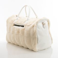 This spacious carrying bag features a fur and leather exterior and designer stylings that make it an impact making addition to any outfit and perfect for either casual or business outings. Product Dimensions (Inches): 21 x 13 x 11 Faux-Leather and Fur Exterior Polyester Lining Luxury Shoulder Bag With Faux Fur Lining, Luxury Faux Fur Shoulder Bag, Luxury Faux Fur Shoulder Bag With Fur Lining, Elegant Winter Shoulder Bag With Faux Fur Lining, Chic Winter Bags For On-the-go, Elegant Faux Fur Winter Bag, Elegant Faux Fur Bags, Elegant Faux Fur Bags For Winter, Luxury Winter Shoulder Bag For Shopping