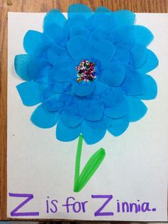 a paper flower with the letter z is for zinna