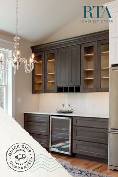 a kitchen with dark wood cabinets and silver appliances in the center is an advertisement for rta cabinet store