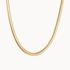 Embrace the elegance of our Snake Chain Necklace, a staple piece to add sophistication to every look. Perfect for wearing alone or for layering alongside your favourite Merci Maman personalized necklaces, this chain is a timeless way to elevate your everyday jewelry collection.&nbsp;18K Champagne Gold Plated or 925 Sterling SilverLength: 0.4Width: 0.09Thickness: 0.05Sent with love in a complimentary gift box Minimalist Gold Plated Double Chain Charm Necklace, Minimalist Double Chain Yellow Gold Necklace, 14k Gold Double Chain Necklace, Minimalist Yellow Gold Charm Necklace With Double Chain, 14k Gold Double Chain Link Necklace, Classic Gold Plated Chain Necklace With Delicate Chain, Classic Gold Plated Box Chain Necklace, Classic Gold Plated Delicate Chain Necklace, Elegant Double Chain 14k Gold Necklace