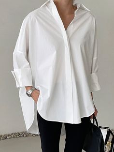 The Oversized Shirt is crafted with premium quality 100% cotton for a soft and comfortable feel. Its loose fit provides maximum comfort, while the pigment washing adds a unique and stylish touch. This button down shirt is perfect for those looking for a high-quality and fashion-forward addition to their wardrobe. One Size (Fits XS-XL) Chest 74cm (Half Width), Body Length 72cm Cotton 100% Machine Wash Delicate cycle with like colors/ Dry Clean for long last Boxy White Shirt Outfit, Black And White Oversized Shirt, Oversized Women Shirt, Unbuttoned Button Up Shirt Outfit, Oversized Bottom Up Shirt Outfit, Stylish T Shirts For Women, Oversized Cotton Shirt With Roll-up Sleeves, Oversized White Top For Casual Gatherings, Cotton Blouse With Relaxed Fit In Solid Color