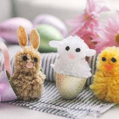 small stuffed animals sitting next to each other on a table