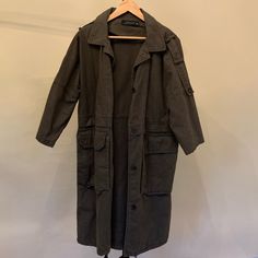 Like New Never Worn Spring Long Coat Parka With Pockets, Fall Utility Parka With Long Sleeves, Fall Utility Long Sleeve Parka, Oversized Spring Parka For Workwear, Oversized Spring Workwear Parka, Vintage Spring Outerwear With Multiple Pockets, Fall Outerwear With Multiple Pockets And Long Sleeves, Khaki Parka For Fall Workwear, Vintage Spring Utility Jacket With Multiple Pockets