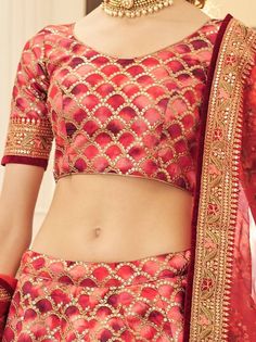 Be a stunner and make your fashion game stronger by wearing this beautiful red color lehenga produced with art silk material assemble with sequins work, dori work, and lace border work. This red lehenga comes with a similar color art silk material choli created with dori work and sequins work. It also comes with a similar color organza dupatta made with floral printed and lace border work. This amazing red traditional lehenga is semi-stitched can fit up to 42 inches and comes with fully unstitch Unstitched Red Choli With Intricate Embroidery, Red Unstitched Embroidered Choli, Unstitched Red Embroidered Choli, Red Unstitched Choli For Reception, Red Lehenga With Intricate Embroidery In Chinon, Unstitched Red Lehenga With Zari Work, Red Unstitched Lehenga For Diwali, Red Festive Unstitched Lehenga, Festive Red Unstitched Lehenga