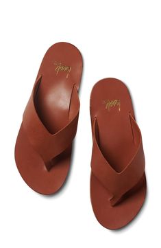 Wide straps carefully crafted from vegetable-tanned leather bring a modern look to this flip-flop set on a rubber sole with reliable traction. Arch support Leather upper and lining/leather and rubber sole Imported Classic Leather Sandals For Everyday, Leather Flip Flops With Cushioned Footbed, Classic Leather Flip Flops With Cushioned Footbed, Casual Leather Flip Flops With Leather Lining, Classic Leather Flip Flops For Beach, Classic Leather Flip Flops For The Beach, Leather Sandals With Leather Sole For Everyday, Leather Sandals With Single Toe Strap For Everyday, Everyday Leather Sandals With Leather Sole