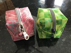 "This little zippered bag can be used as an eco-friendly mini jewelry case, cosmetic case or to store a pacifier on travel as this fully-lined cube pod has no untidy-seams to entangle with the little things you place inside.    This is a very creative way to use fabric left over from other projects. Make some of them during your free time and use them as gifts for baby showers, birthdays or Christmas.     We provide the ACTUAL SIZE (a cube of 2 ½ inch each side) pattern on a PDF! All you need is to cut out the fabric using the pattern we provided and follow the instructions in the tutorial to stitch it. Our tutorial includes many actual photographs to explain the sewing steps. You are minutes away from having your own creation! You can easily print this pattern on a letter size paper (8.5\ Pacifier Pouch, Mini Jewelry, Gifts For Baby, Zippered Bag, Pouch Pattern, Coin Purses, Purse Pouch, The Little Things, Jewelry Case