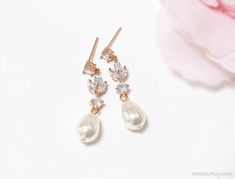 Bridal pearl earrings Rose gold earrings crystal pearl | Etsy Elegant Rose Gold Teardrop Bridal Earrings, Rose Gold Cubic Zirconia Dangle Pearl Earrings, Rose Gold Bridal Drop Earrings With Pearl, Rose Gold Drop Earrings With Pearl Detail For Bridal, Rose Gold Teardrop Pearl Earrings For Party, Rose Gold Pear-shaped Wedding Earrings, Pear-shaped Rose Gold Earrings For Wedding, Rose Gold Teardrop Pearl Earrings For Wedding, Rose Gold Pearl Drop Dangle Earrings