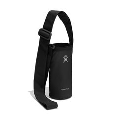 a black bag with a white logo on the front and shoulder strap attached to it