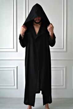 "HOODED LINEN ROBE for MEN, HANDMADE LINEN ROBE This robe is a very cozy and comfortable wear. Take it with you on vacation, a business trip or to a SPA - and you will always feel at home:) The robe features: - Front wrap - Hood - Long sleeves with lapels - Belt - Two inseam pockets - Ankle length It is made of pure organic European linen which is soft, breathable and pleasant to the skin. It keeps you cool in hot weather and makes you feel warm and cozy on cooler days. COLOR: pitch black. Also Black Winter Loungewear Robe, Winter Black Robe For Loungewear, Black Long Sleeve Robe For Loungewear, Black Long Sleeve Robe For Fall, Oversized Long Sleeve Winter Robe, Robe For Men, Linen Outfits, Linen Robe, Bathrobe Men