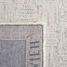 a close up view of the corner of a rug